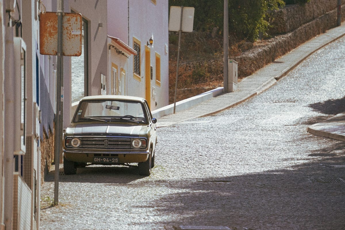 Importing a Car to Portugal in 2026 — The Transferência de Residência ISV Exemption, the DAV Customs Declaration, the Modelo 112 Inspection, the IMT Homologation, and What the Process Actually Costs