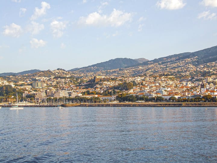 The city of Funchal, Madeira, rising above its Atlantic harbour, seen from the sea