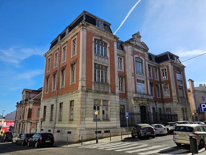 The facade of the former Marquês de Pombal Industrial School building in Alcântara, Lisbon