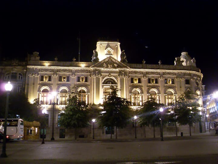 The illuminated Bank of Portugal building at night