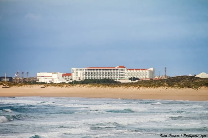 Waves rolling onto Praia dos Supertubos in Peniche, a famous Portuguese surf beach near Obidos