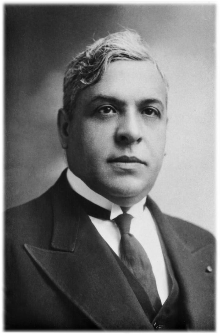 Black-and-white 1940 portrait of Aristides de Sousa Mendes, the Portuguese consul who issued visas to refugees fleeing Nazism, in a dark suit and tie