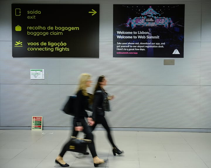 Web Summit signage welcoming arrivals to Lisbon, evoking Portugal's technology startup scene