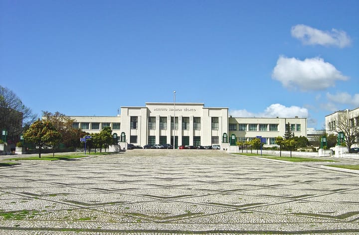 The Instituto Superior Tecnico central pavilion on the Alameda campus in Lisbon, seen across its calcada forecourt