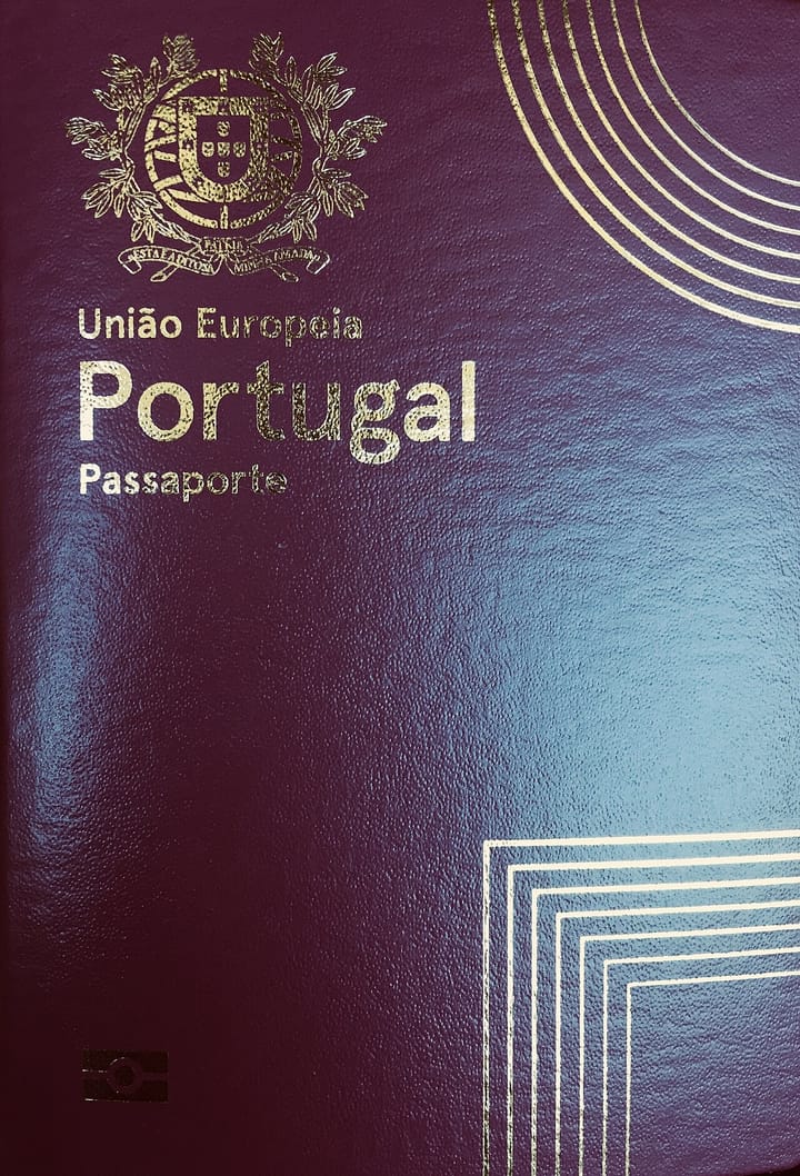 The burgundy cover of a Portuguese European Union passport, one of the two documents now required for travel after the old paper identity card was retired