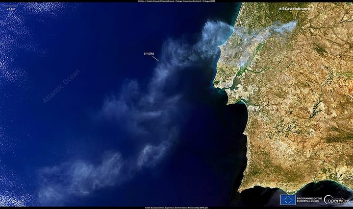 A Copernicus Sentinel satellite view of Portugal with a plume of wildfire smoke drifting off the coast over the Atlantic near Lisbon
