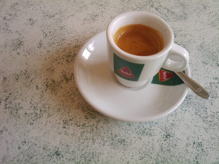 A small Delta espresso, the everyday coffee ritual at the heart of Portugal's café culture