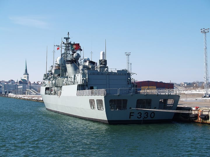 The Portuguese Navy frigate NRP Vasco da Gama moored in port with the national flag flying on its mast