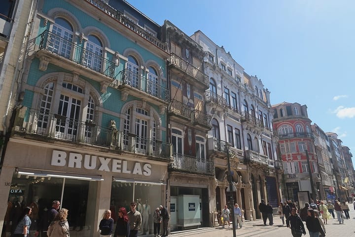 Rua de Santa Catarina, Porto's main pedestrian shopping street, with azulejo-tiled facades and shoppers