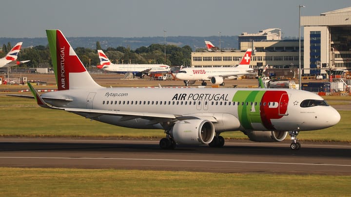 A TAP Air Portugal Airbus A320neo in current livery taxiing at London Heathrow