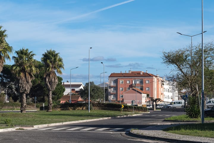 An ordinary Portuguese residential apartment block and houses on a street in Caldas da Rainha
