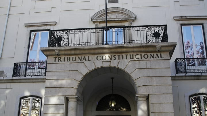 The entrance of the Constitutional Court building in Lisbon, with its name carved above the arch