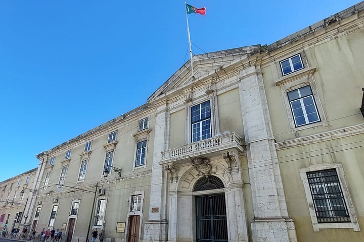 The façade of the Tribunal da Relação de Lisboa, the Lisbon Court of Appeal, with the Portuguese flag flying above its entrance